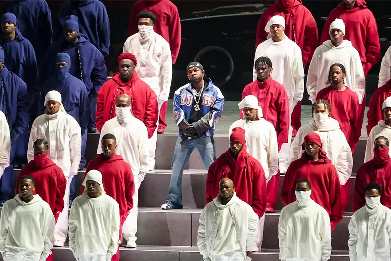 Kendrick Lamar performing 'Not Like Us' at Coachella 2025 with animated protest visuals